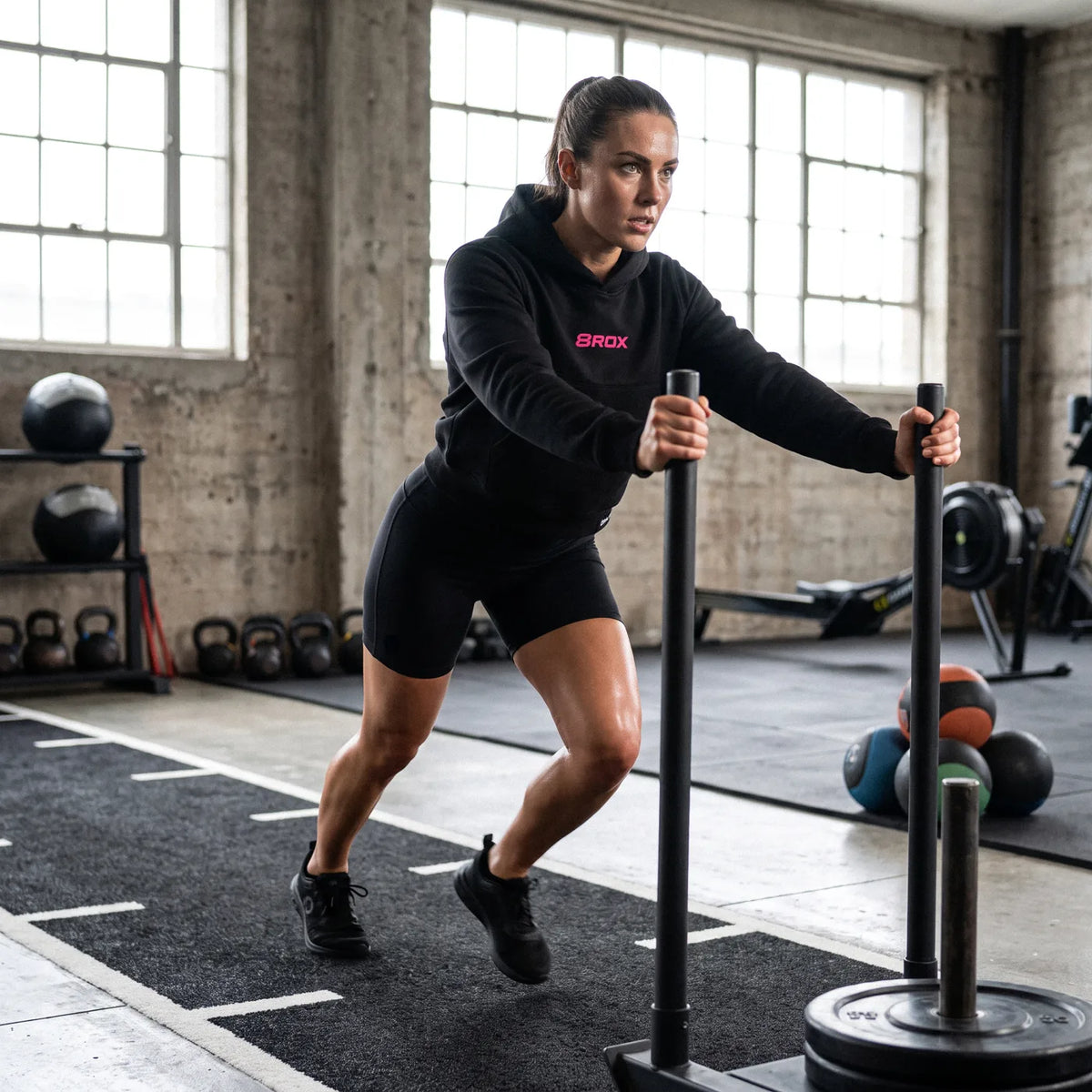 Ladies Big 8 Performance Hoodie - Black / Pink in use